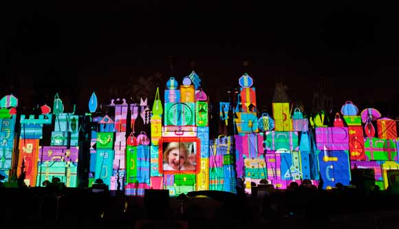 Magic, Memories and You projected on "it's a small world" attraction