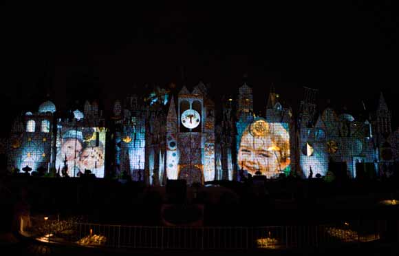 Magic, Memories and You projected on "it's a small world" attraction