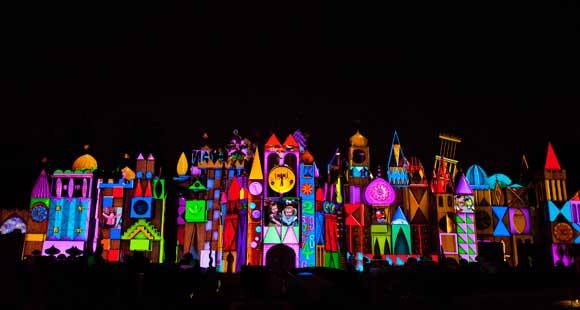 Magic, Memories and You projected on "it's a small world" attraction